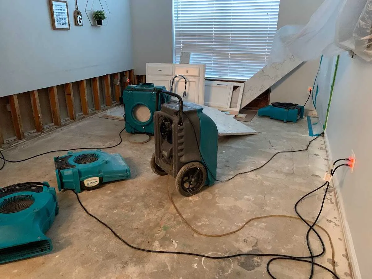 Dehumidifier in flood-cut room for Water Damage Restoration in Orlando